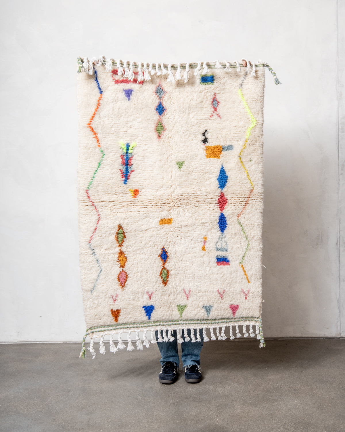 Modern, designer, handcrafted Berber rug from Morocco. Beniourain carpet with beautiful colours and patterns and fluffy wool texture.